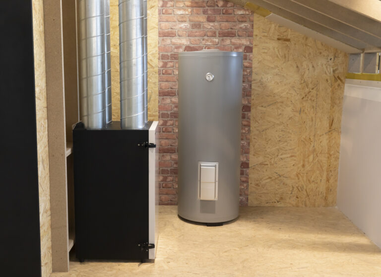 Traditional water heater in home utility space