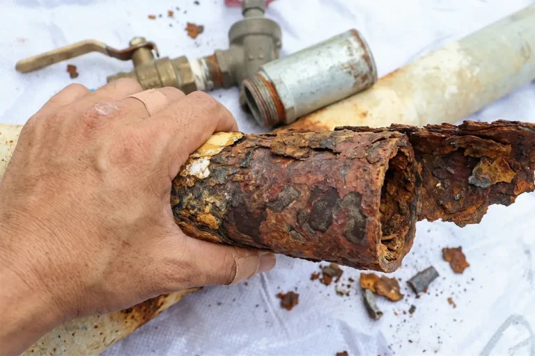 Corroded drain pipe showing severe damage, causing recurring drain problems that require drain repair Texas homeowners trust.