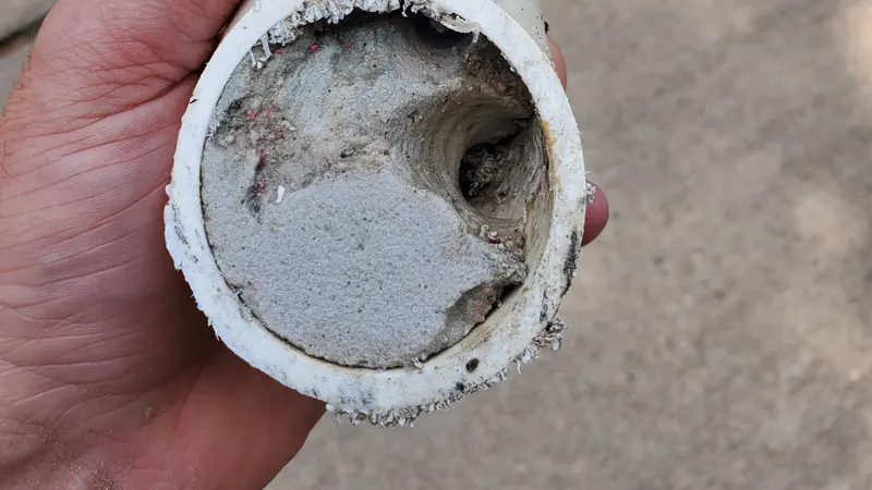 Blocked drain pipe removed during a Champion plumbing job
